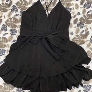 Pink lily black romper size L.